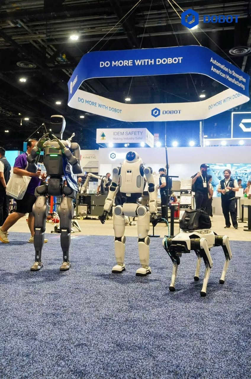 DOBOT stand at a trade fair in the USA: ATOM and LUMO humanoids and a quadruped robot